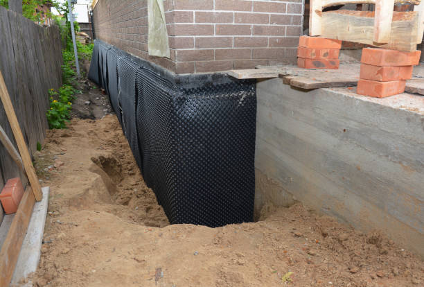 SJ Waterproofing Pros technician performing targeted Exterior Waterproofing assessment in Silver Lake, OH